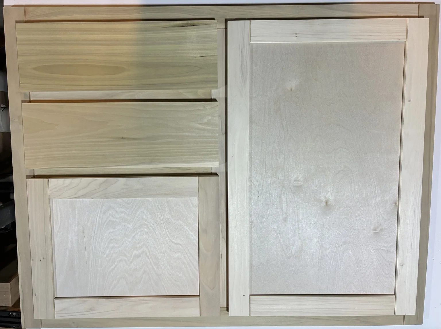 Shaker doors and mixed drawer fronts before finishing